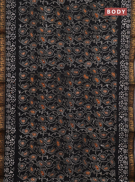 Sungudi cotton saree black with allover batik prints and zari woven printed border