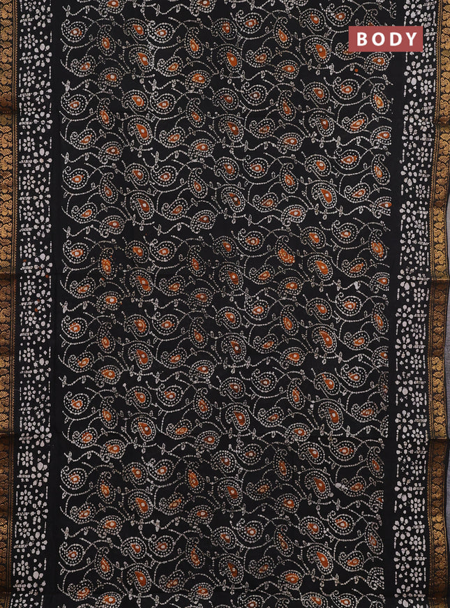 Sungudi cotton saree black with allover batik prints and zari woven printed border