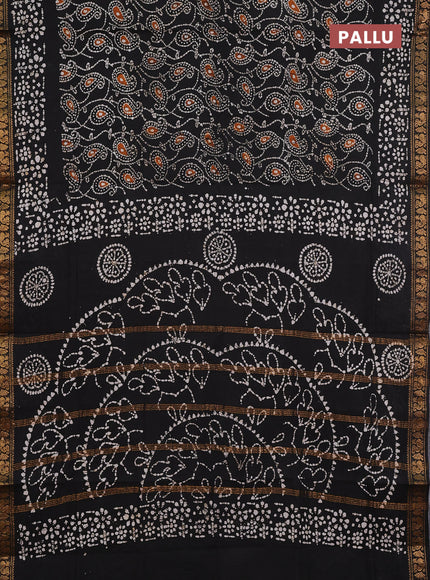 Sungudi cotton saree black with allover batik prints and zari woven printed border