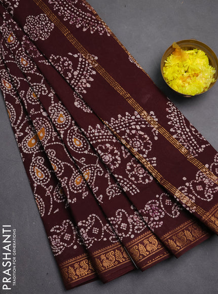 Sungudi cotton saree deep brown with allover batik prints and printed zari woven border