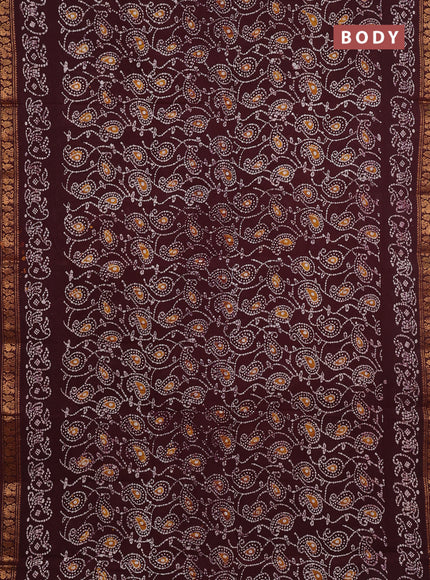 Sungudi cotton saree deep brown with allover batik prints and printed zari woven border