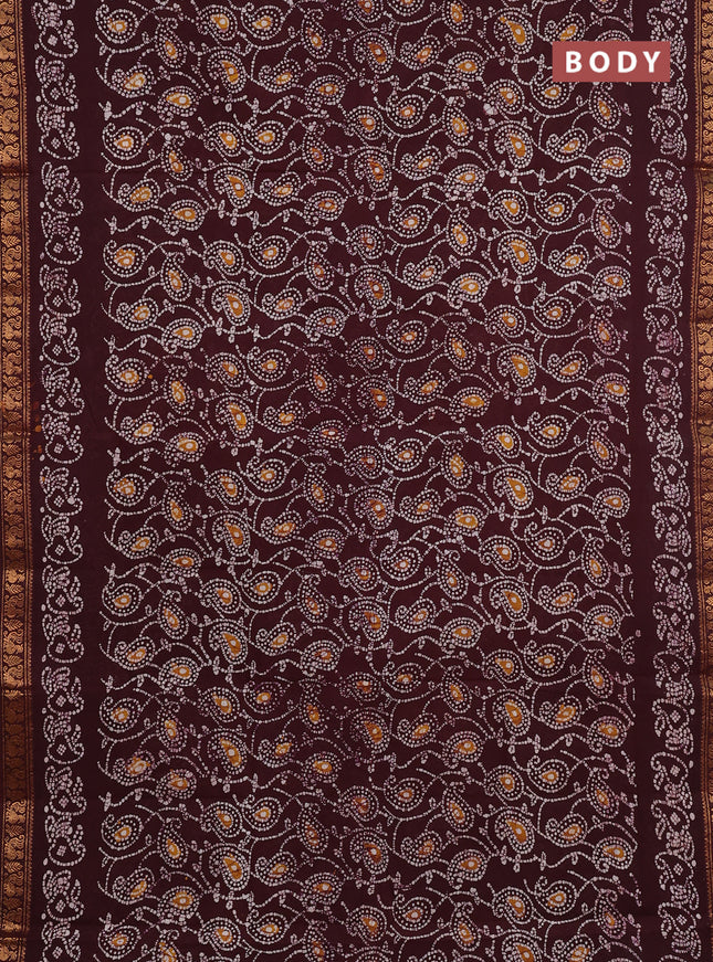 Sungudi cotton saree deep brown with allover batik prints and printed zari woven border