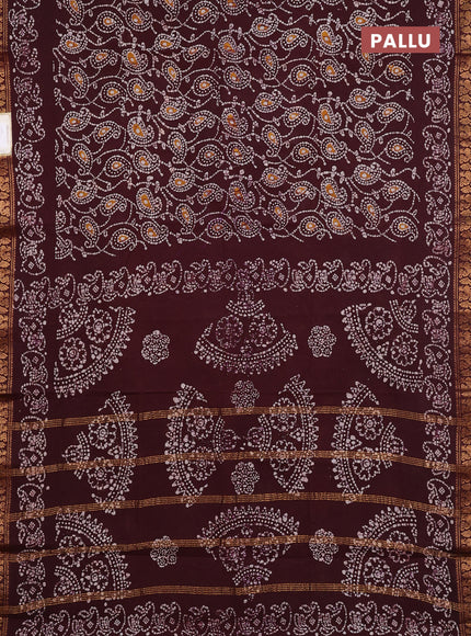 Sungudi cotton saree deep brown with allover batik prints and printed zari woven border