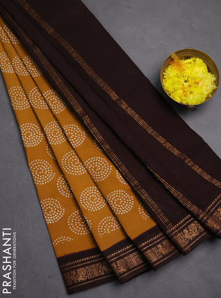 Sungudi cotton saree mustard yellow and dark coffee brown with allover batik butta prints and zari woven border