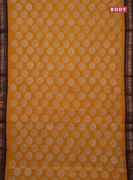 Sungudi cotton saree mustard yellow and dark coffee brown with allover batik butta prints and zari woven border
