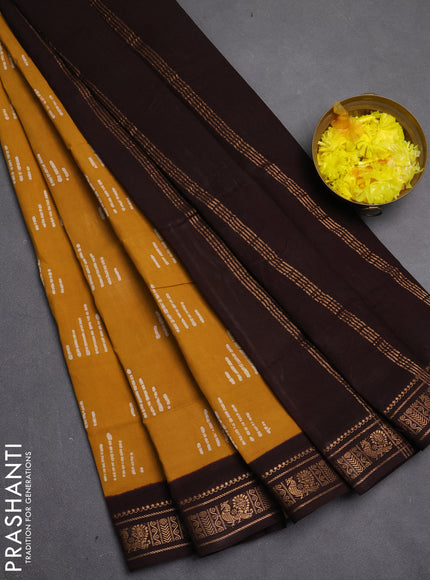Sungudi cotton saree mustard yellow and dark coffee brown with allover batik butta prints and zari woven border
