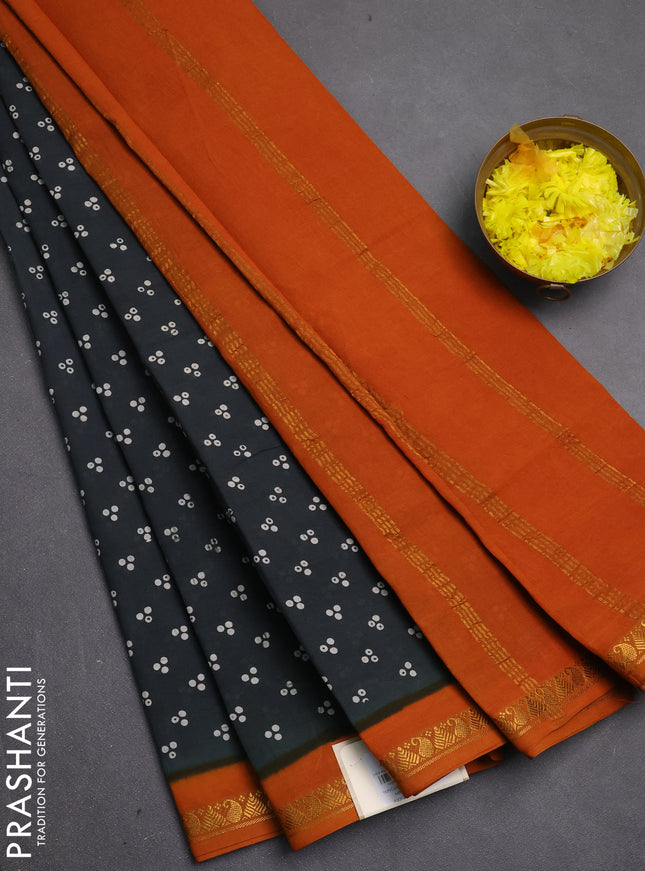 Sungudi cotton saree elephant grey and mustard yellow with allover batik butta prints and zari woven border