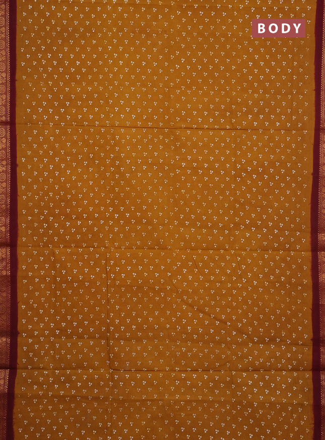 Sungudi cotton saree dark mustard yellow and maroon with allover batik butta prints and zari woven border