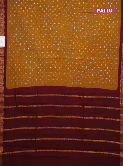 Sungudi cotton saree dark mustard yellow and maroon with allover batik butta prints and zari woven border