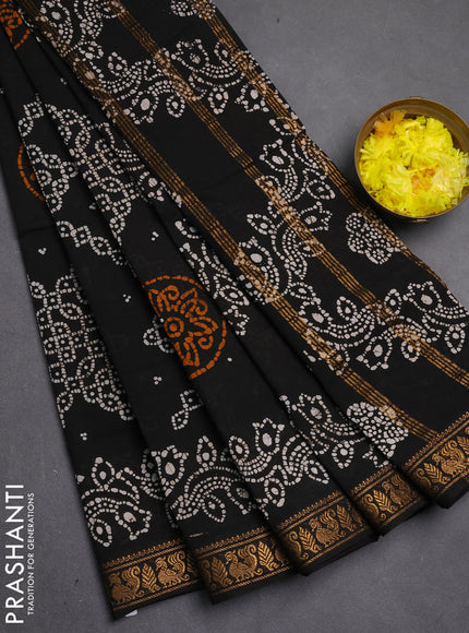 Sungudi cotton saree black with allover batik prints and zari woven printed border