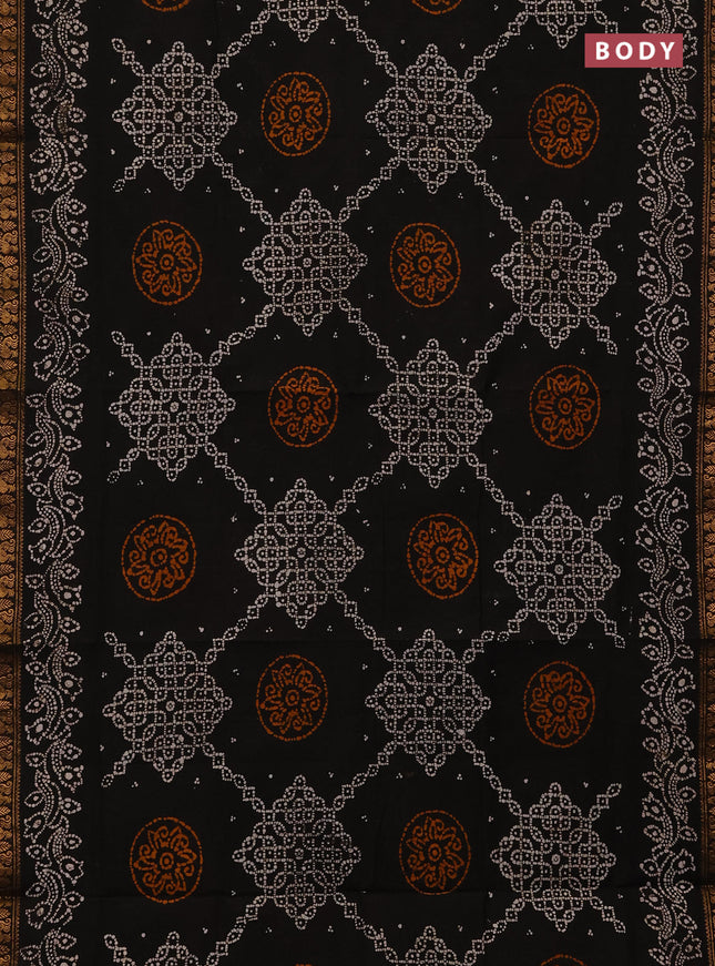 Sungudi cotton saree black with allover batik prints and zari woven printed border