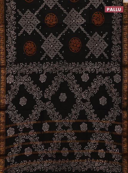 Sungudi cotton saree black with allover batik prints and zari woven printed border