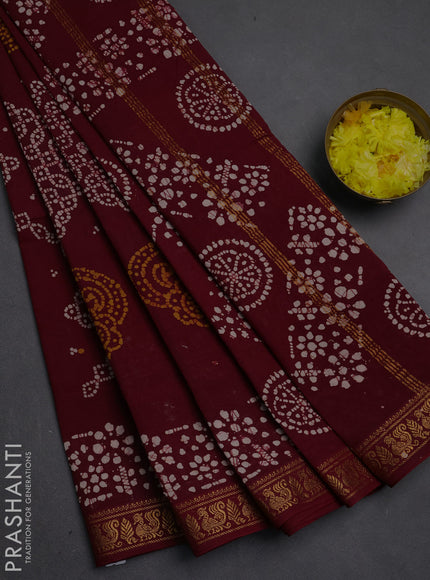 Sungudi cotton saree maroon with allover batik prints and zari woven printed border