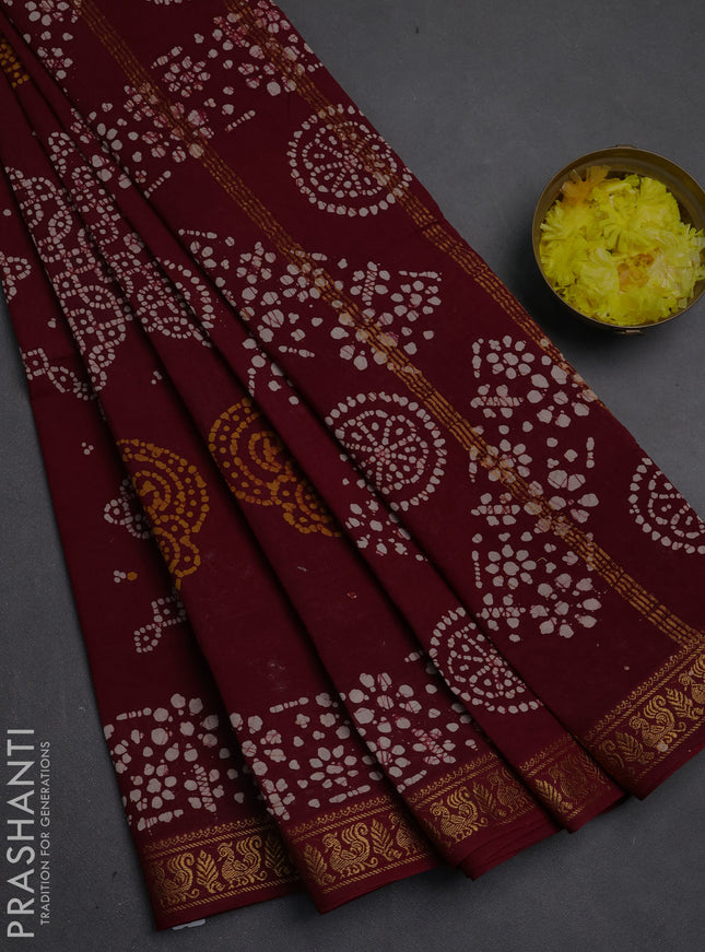 Sungudi cotton saree maroon with allover batik prints and zari woven printed border