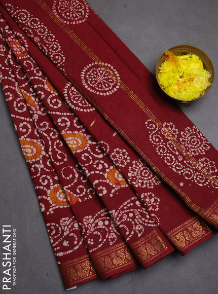 Sungudi cotton saree maroon with allover batik prints and zari woven border