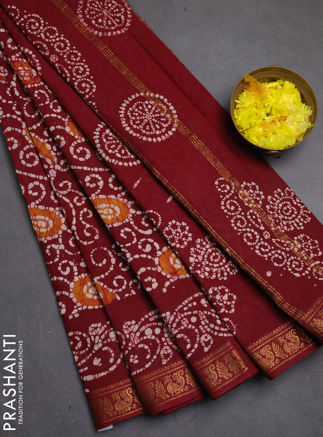 Sungudi cotton saree maroon with allover batik prints and zari woven border