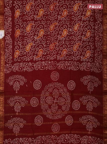 Sungudi cotton saree maroon with allover batik prints and zari woven border