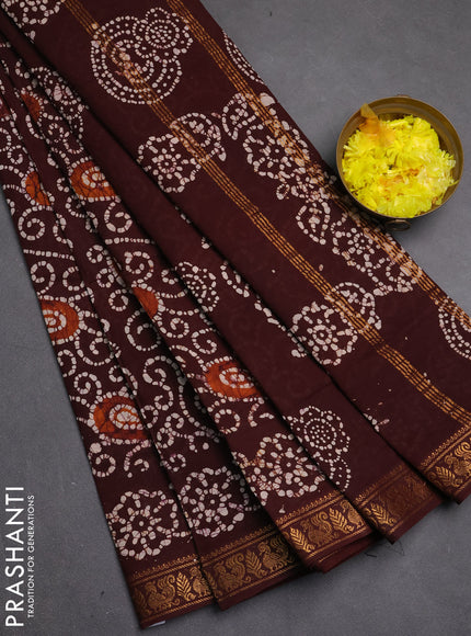 Sungudi cotton saree deep brown with allover batik prints and printed zari woven border
