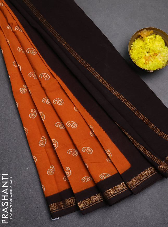 Sungudi cotton saree mustard yellow and coffee brown with allover paisley batik butta prints and zari woven border