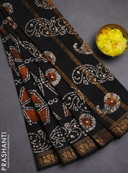 Sungudi cotton saree black with allover batik geometric prints and zari woven printed border