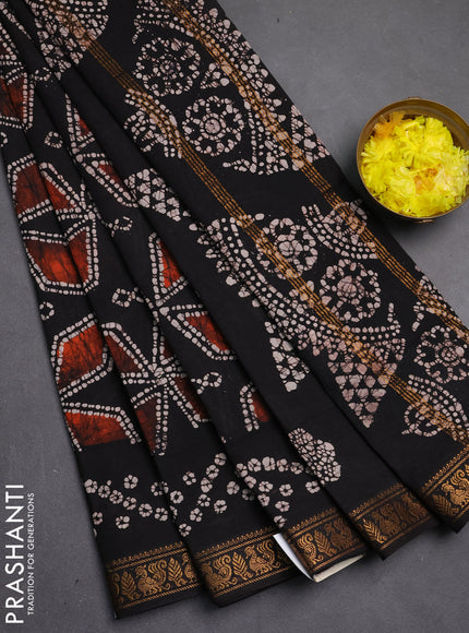 Sungudi cotton saree black with allover batik geometric prints and zari woven printed border
