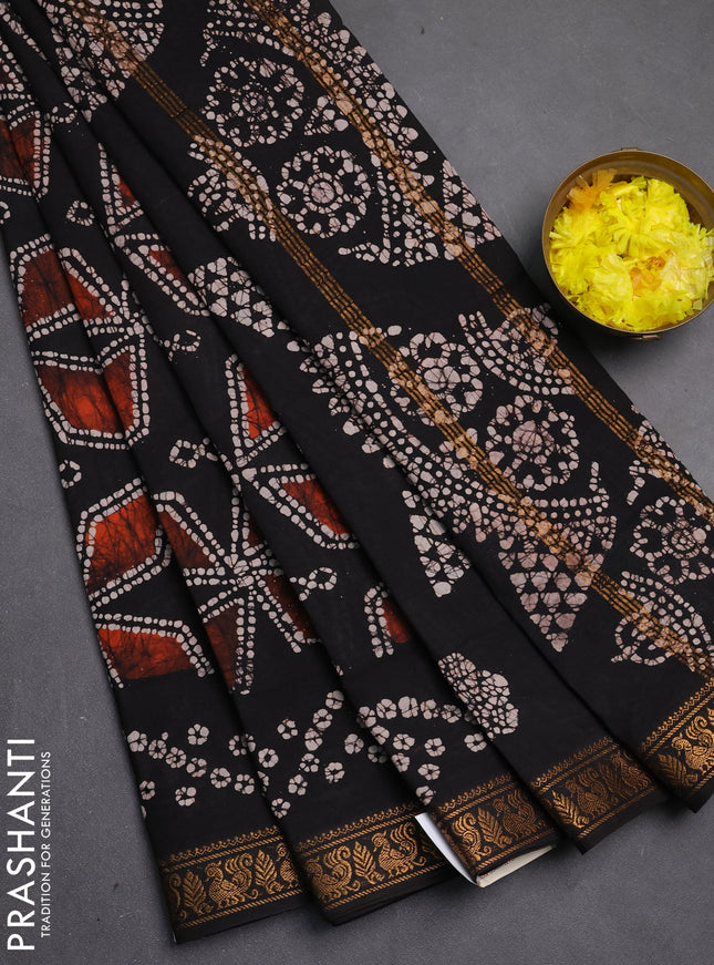 Sungudi cotton saree black with allover batik geometric prints and zari woven printed border