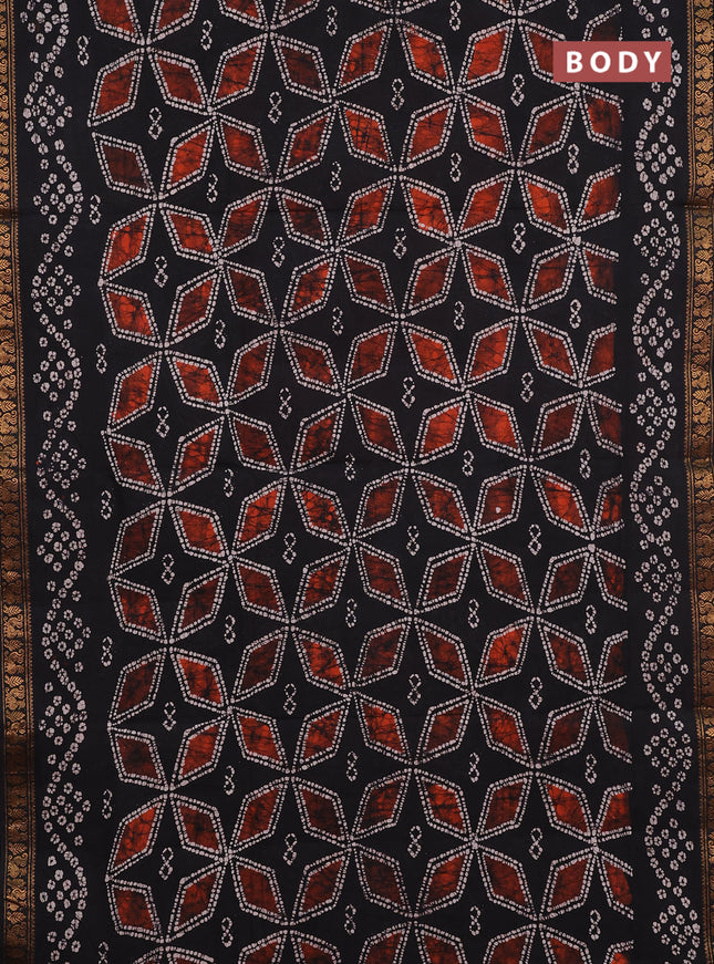 Sungudi cotton saree black with allover batik geometric prints and zari woven printed border