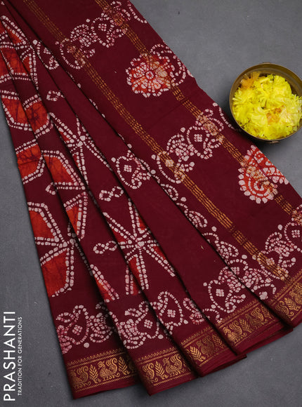 Sungudi cotton saree maroon with allover batik geometric prints and zari woven printed border