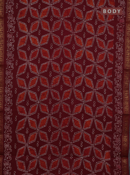 Sungudi cotton saree maroon with allover batik geometric prints and zari woven printed border