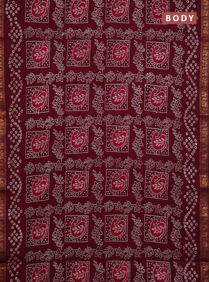Sungudi cotton saree wine with allover batik prints and zari woven border