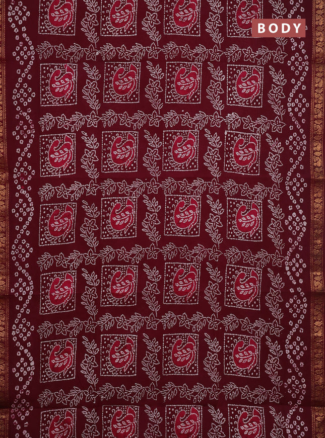 Sungudi cotton saree wine with allover batik prints and zari woven border