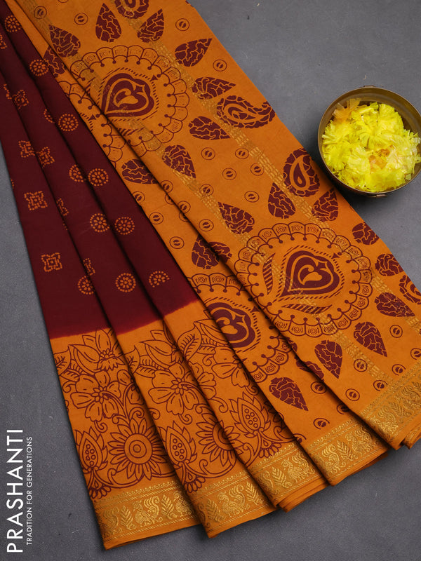 Sungudi cotton saree deep brown and mustard yellow with allover batik butta prints and long zari woven pritned border