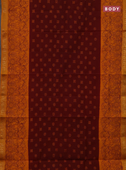 Sungudi cotton saree deep brown and mustard yellow with allover batik butta prints and long zari woven pritned border