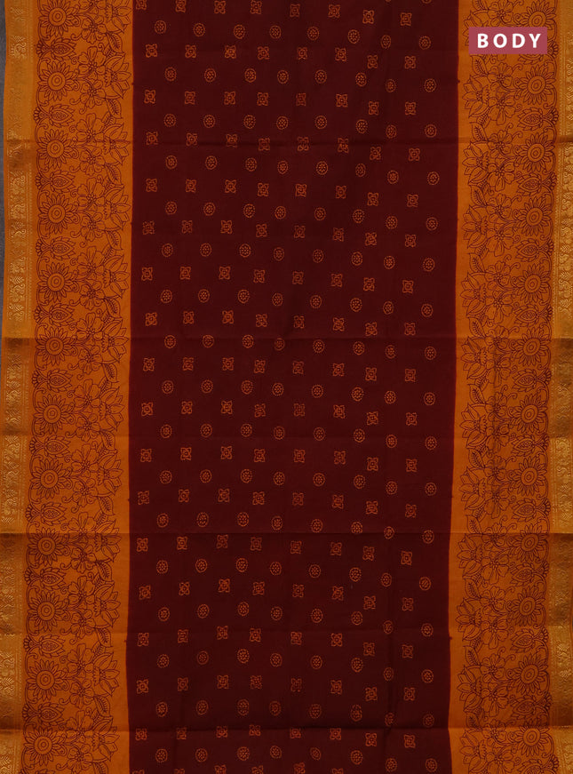Sungudi cotton saree deep brown and mustard yellow with allover batik butta prints and long zari woven pritned border