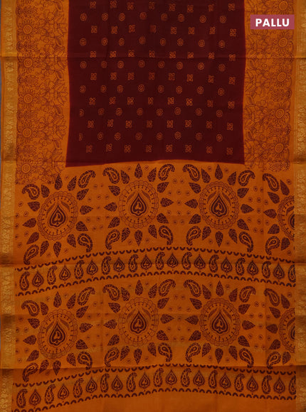 Sungudi cotton saree deep brown and mustard yellow with allover batik butta prints and long zari woven pritned border