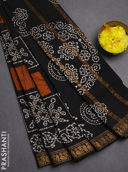 Sungudi cotton saree black with allover batik prints and zari woven printed border