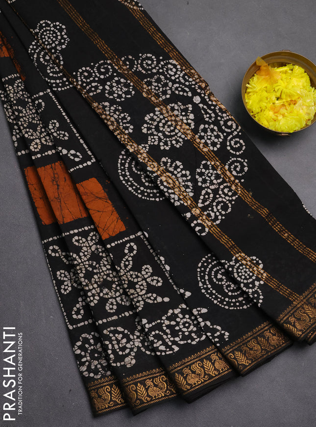 Sungudi cotton saree black with allover batik prints and zari woven printed border