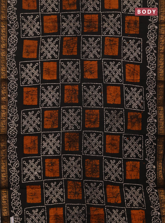 Sungudi cotton saree black with allover batik prints and zari woven printed border