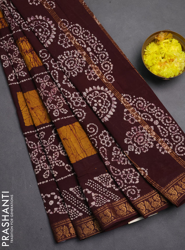 Sungudi cotton saree deep brown with allover batik prints and zari woven printed border