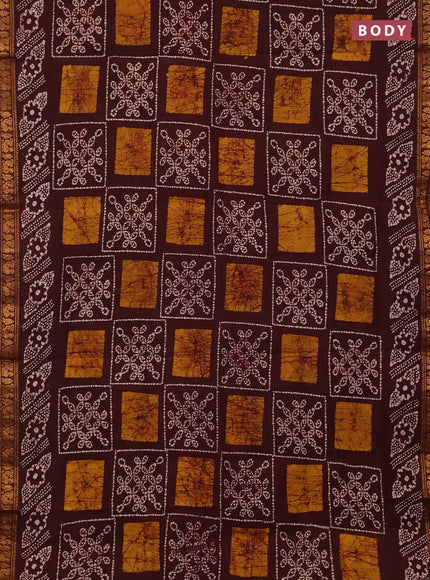 Sungudi cotton saree deep brown with allover batik prints and zari woven printed border