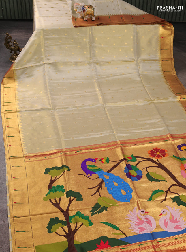 Tissue silk saree cream and red with allover zari woven buttas and paithani pallu & muniya border