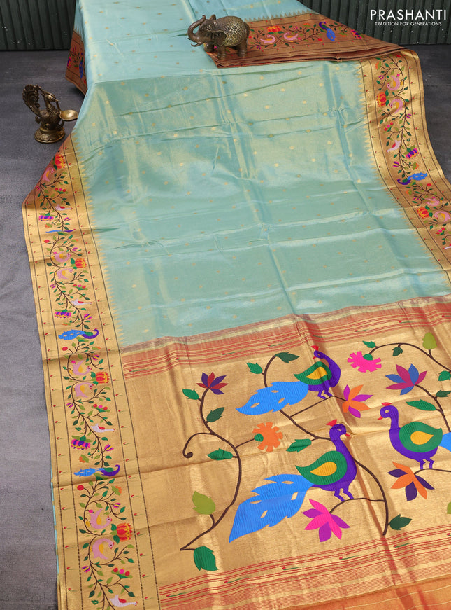 Tissue silk saree teal blue with allover zari woven buttas and paithani pallu & border