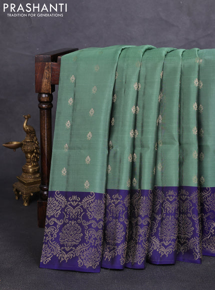 Kanchipuram soft silk saree pastel green and navy blue with allover zari woven buttas and zari woven border
