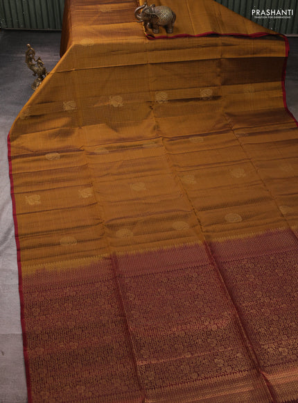 Kanchipuram soft silk saree dark mustard and deep maroon with allover zari checks & buttas and piping border