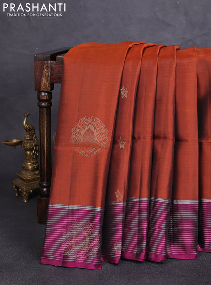 Kanchipuram soft silk saree rustic orange and magenta pink with allover zari woven buttas and zari woven border