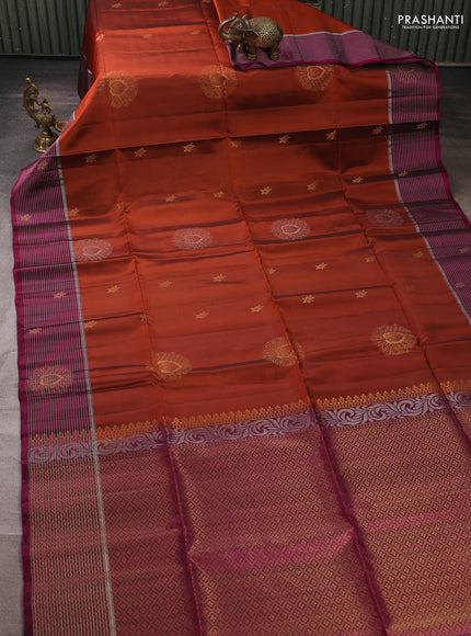 Kanchipuram soft silk saree rustic orange and magenta pink with allover zari woven buttas and zari woven border