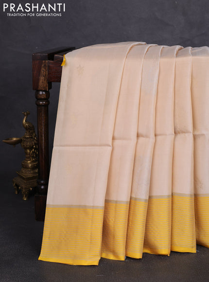 Kanchipuram soft silk saree beige and yellow with allover zari woven buttas and zari woven border