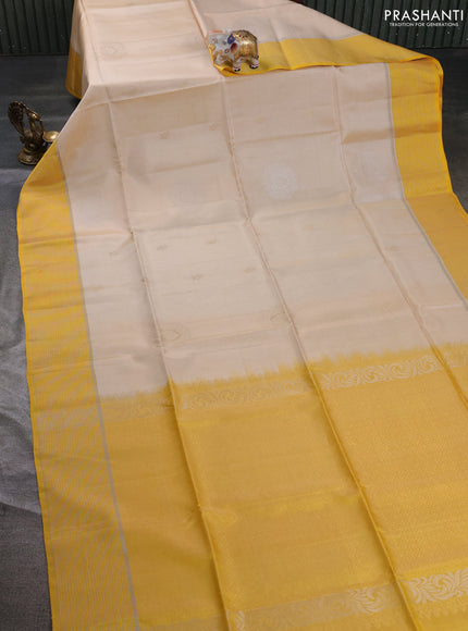 Kanchipuram soft silk saree beige and yellow with allover zari woven buttas and zari woven border