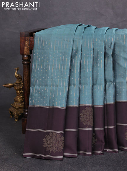 Kanchipuram soft silk saree bluish green and deep wine with allover silver & gold zari weaves and long zari woven butta border