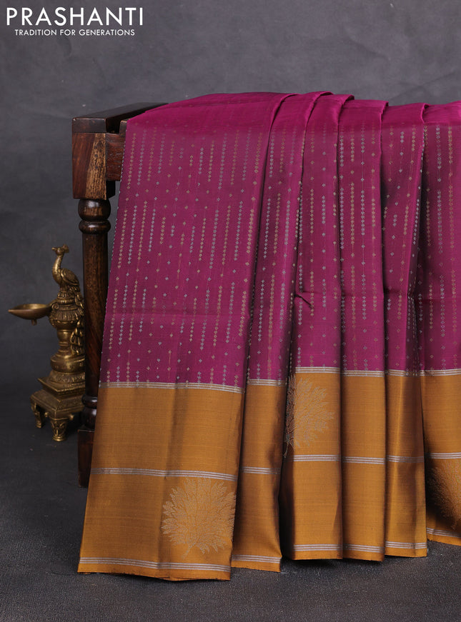 Kanchipuram soft silk saree magenta pink and mustard yellow with allover silver & gold zari weaves and long zari woven butta border